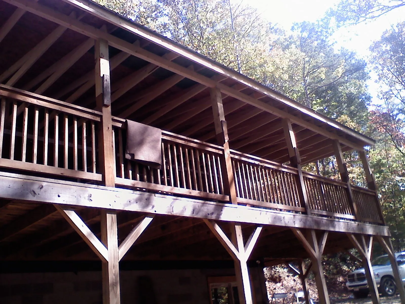 Timber framing under a new elevated porch and deck — Roof Leak Repair in Belfair by Roofing Brothers